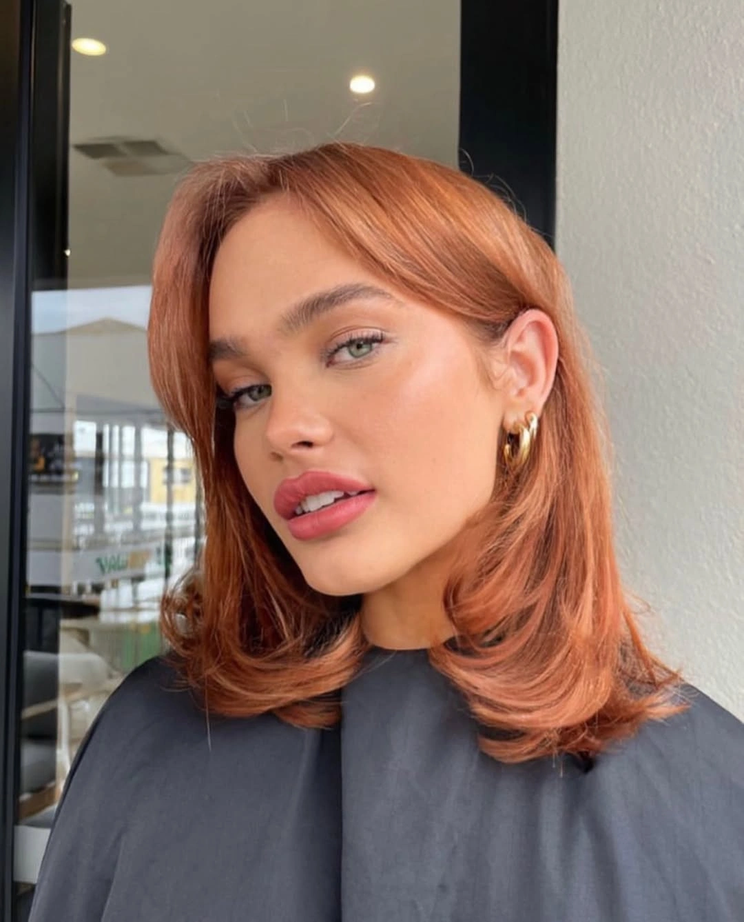 Fall hair colour ideas 2026 Glossy Copper with Softly Flipped Ends