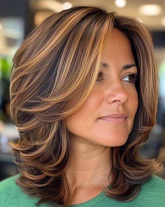 fall haircuts for women 2026 Caramel Framed Medium Layers With Soft Volume