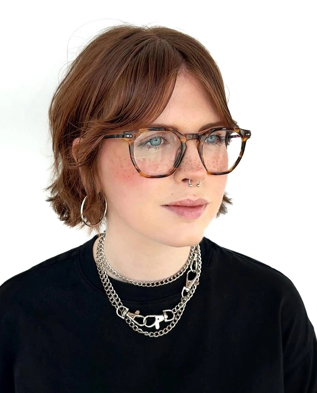 fall haircuts for women 2026 Auburn Shag Bob With Side-Swept Bangs