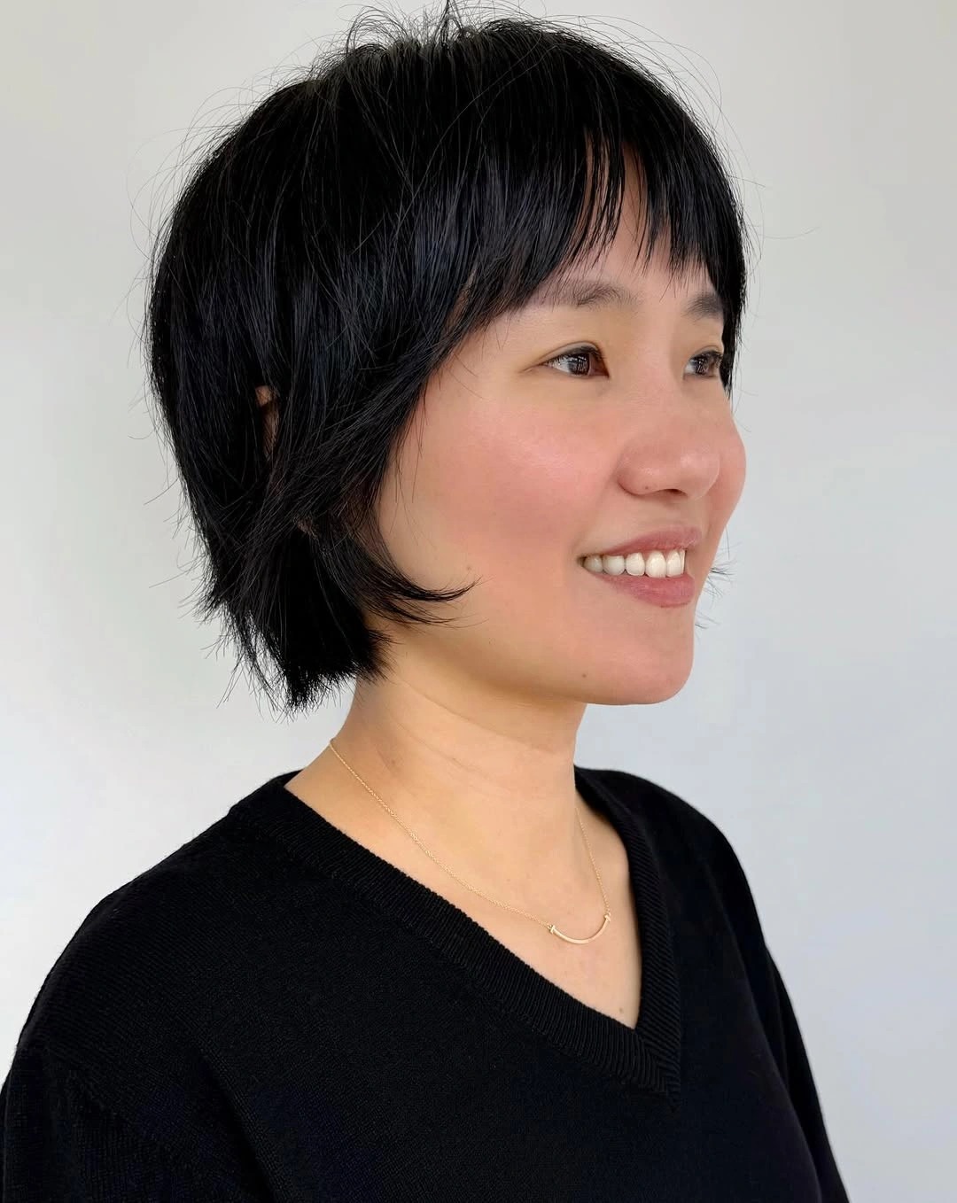 fall haircuts for women 2026 Soft Black Bixie With Wispy Micro Bangs