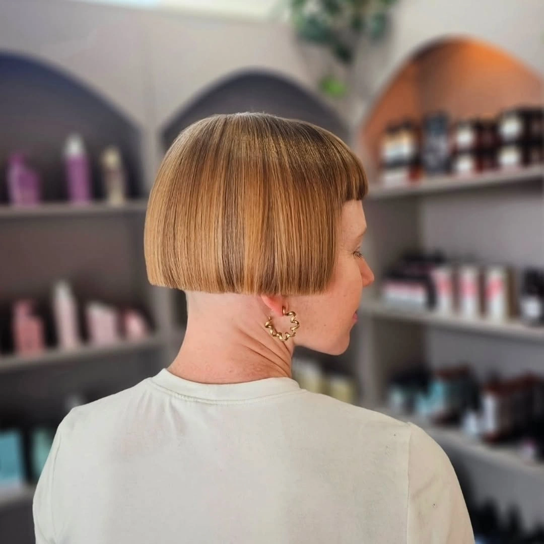 fall haircuts for women 2026 Blunt Blonde Bowl Bob With Clean Precision