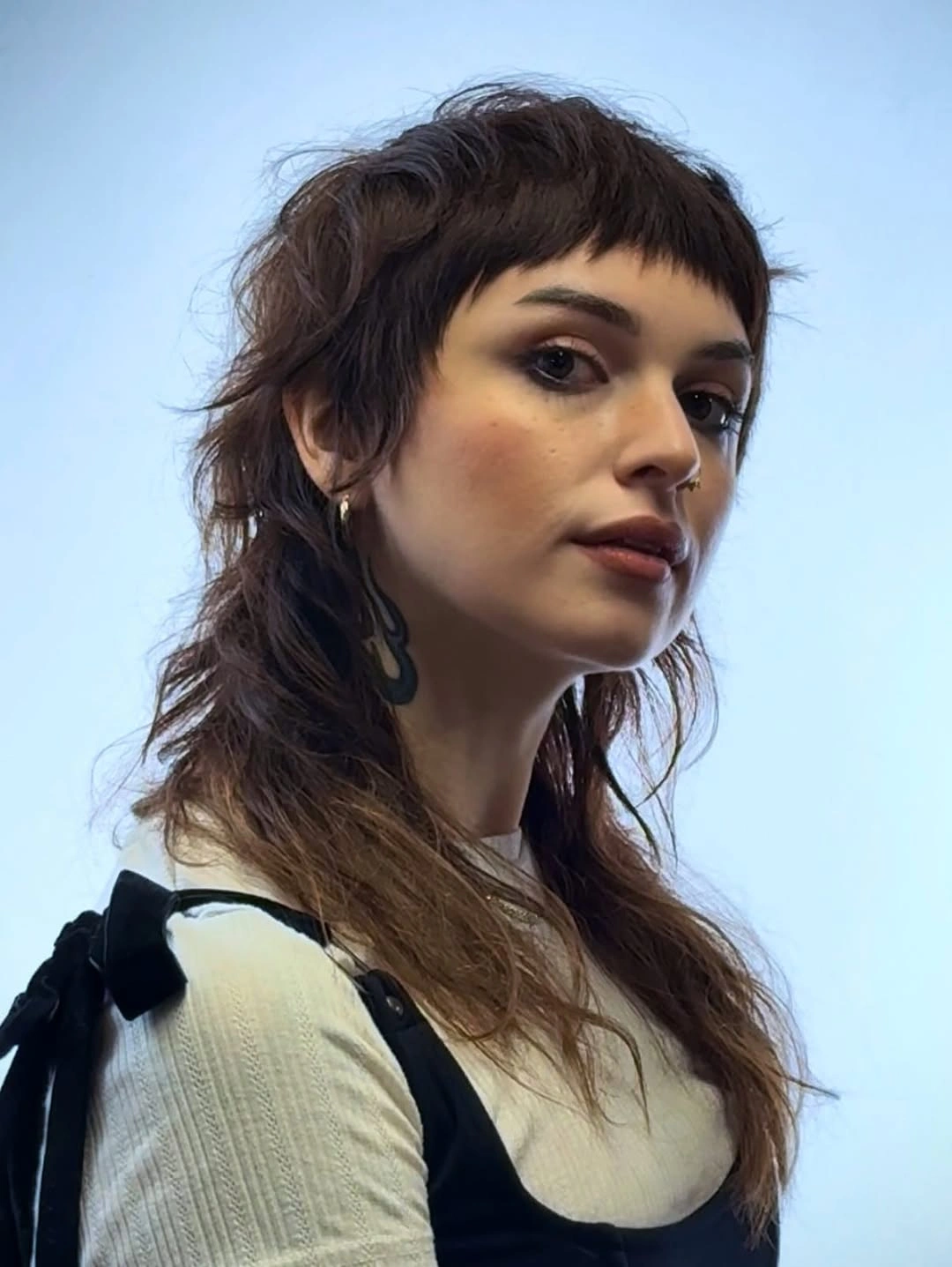 fall haircuts for women 2026 Long Wolf Cut With Cropped Bangs And Wispy Ends