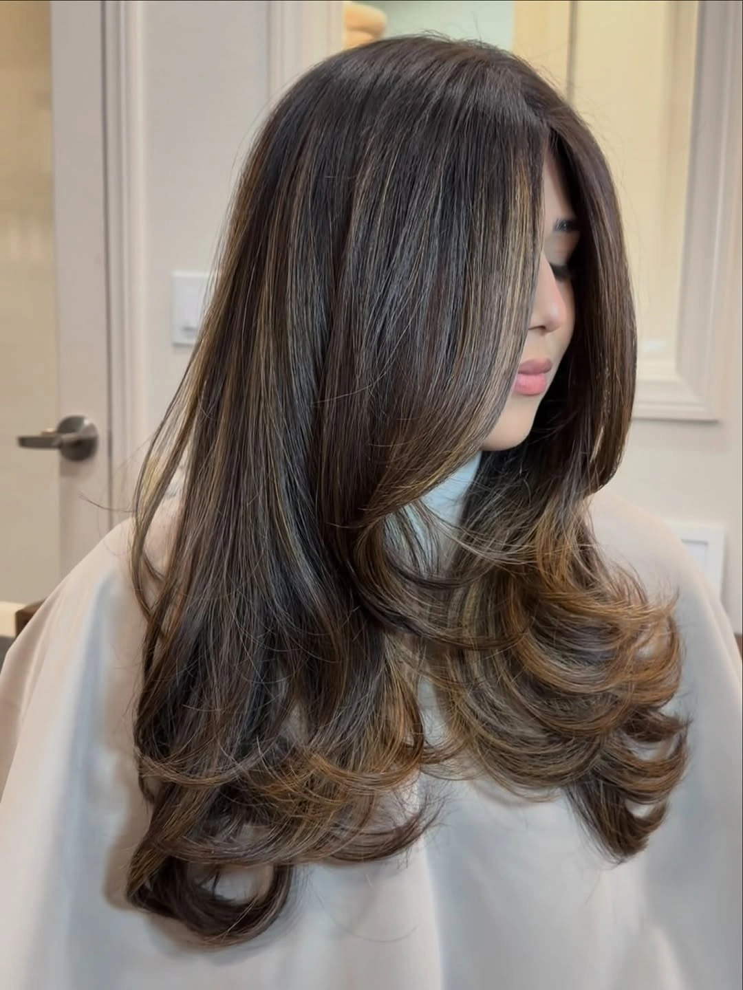 fall haircuts for women 2026 Long Feathered Layers With Dimensional Brunette Shine