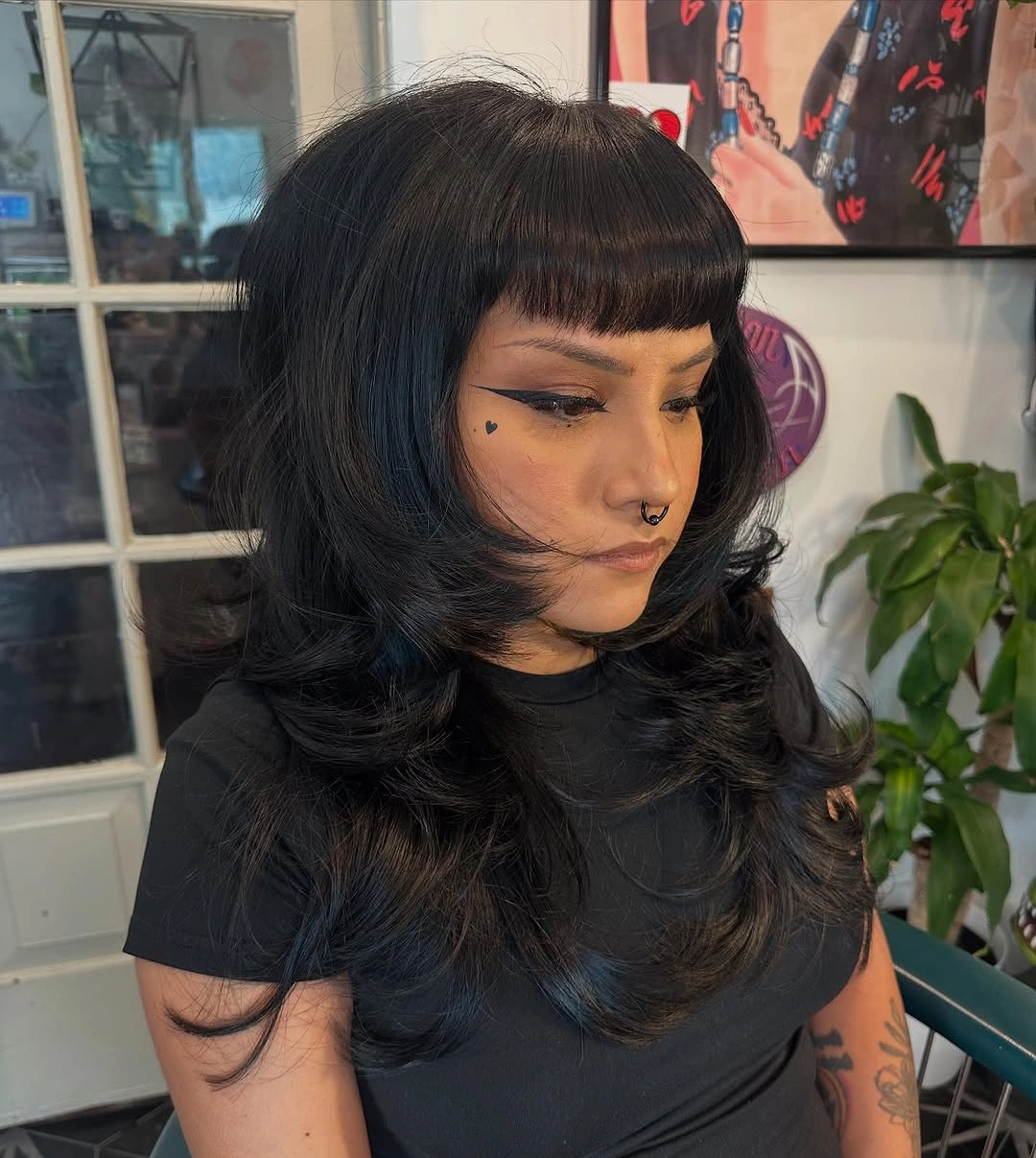 fall haircuts for women 2026 Glossy Black Layers With Blunt Micro Bangs