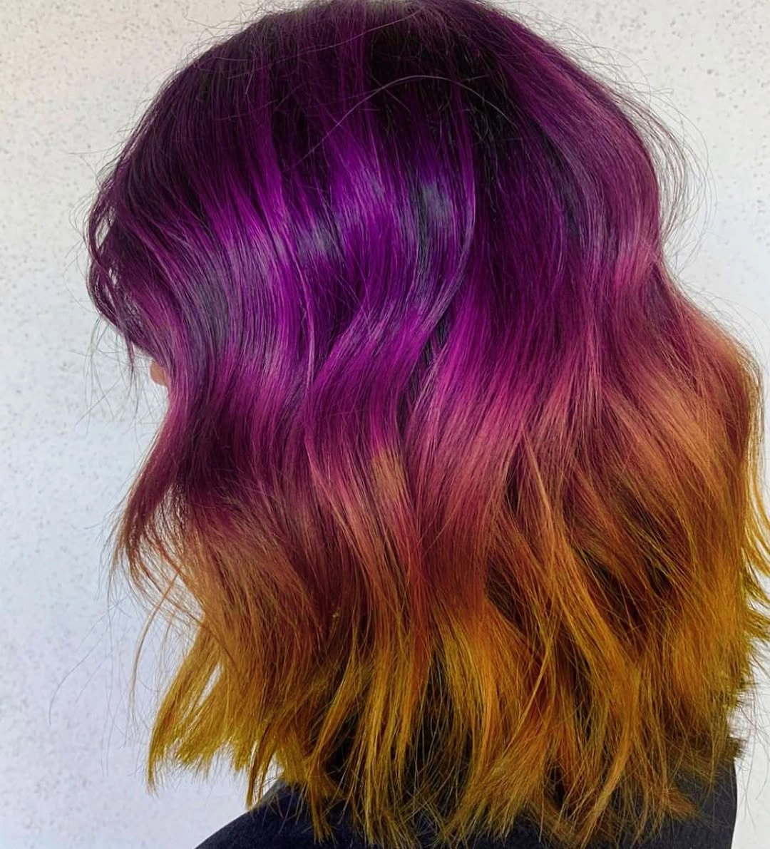 fall hairstyles 2026 Magenta And Golden Wavy Lob