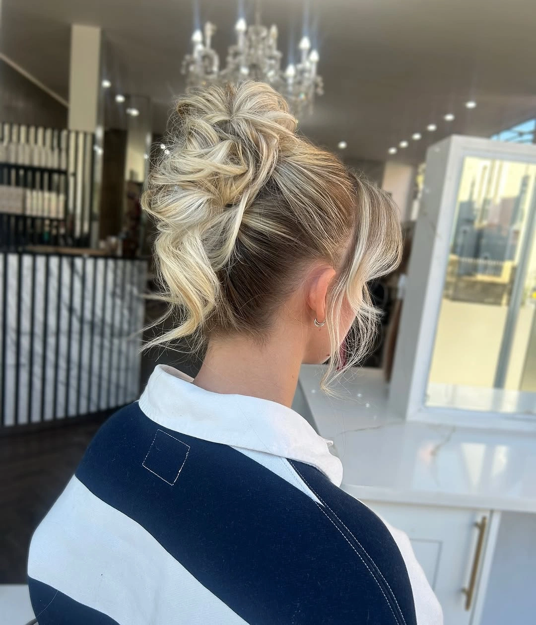 fall hairstyles for long hair 2026 Textured Blonde Updo With Loose Romantic Curls