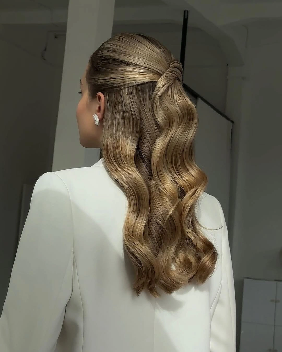 fall hairstyles for long hair 2026 Polished Blonde Half-Up Waves With a Wrapped Finish