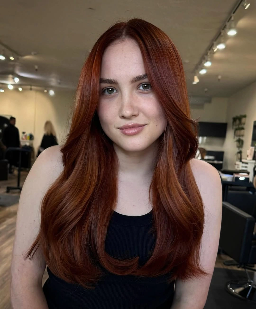 fall hairstyles for long hair 2026 Velvet Copper Layers With a Center-Part Sweep