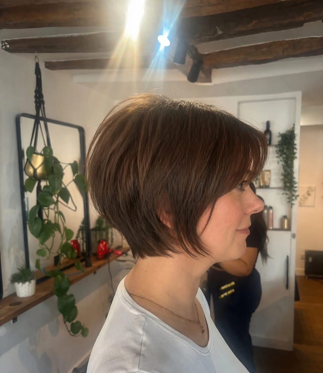 fall hairstyles for short hair 2026 Layered Chestnut Bob With Soft Side Volume