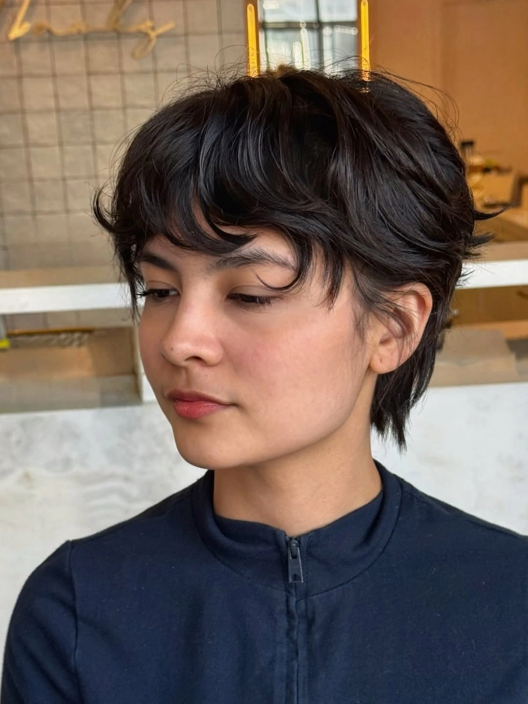 fall hairstyles for short hair 2026 Soft Curly Pixie With Natural Movement