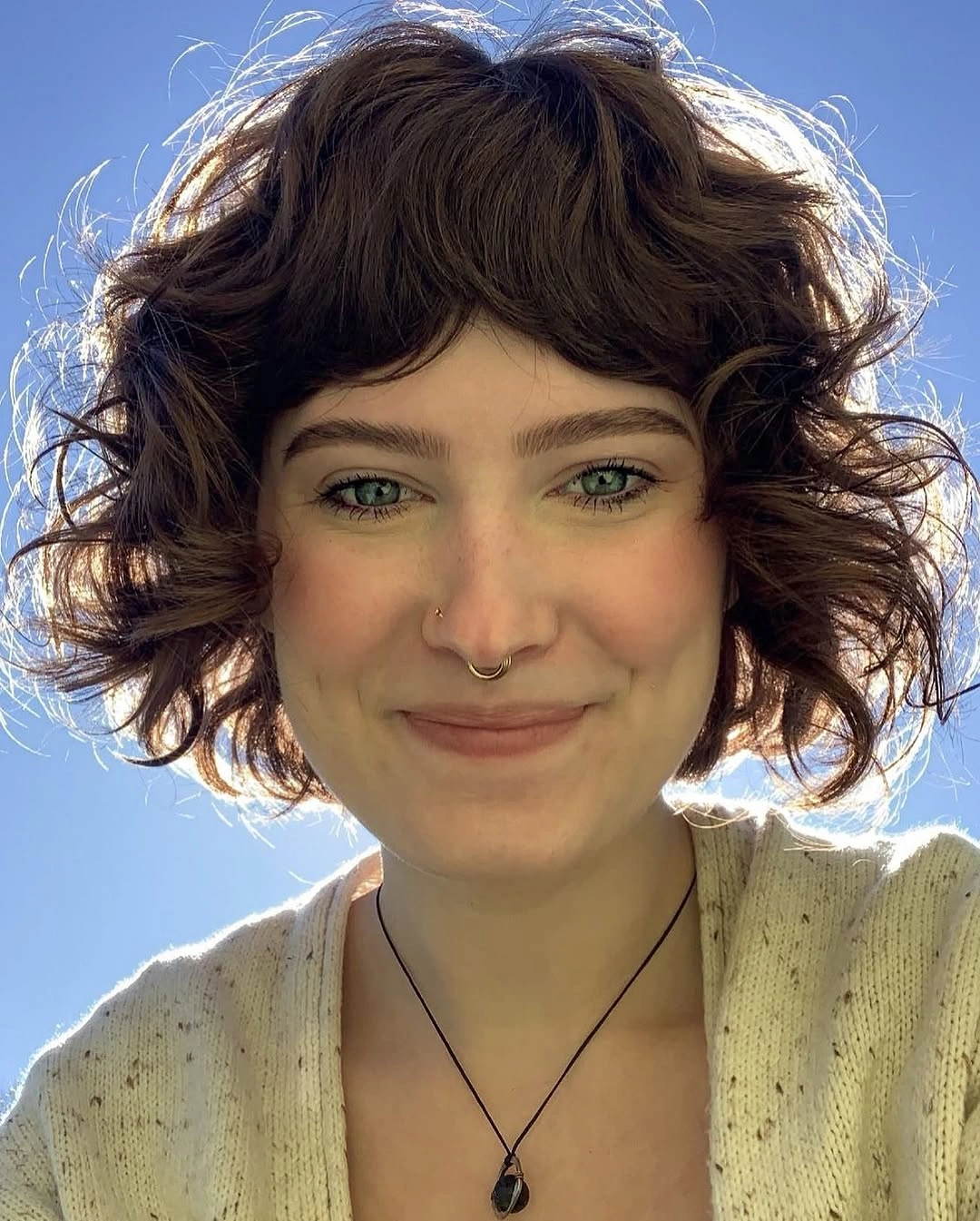 fall hairstyles for short hair 2026 Curly Short Shag With Sunlit Fall Texture
