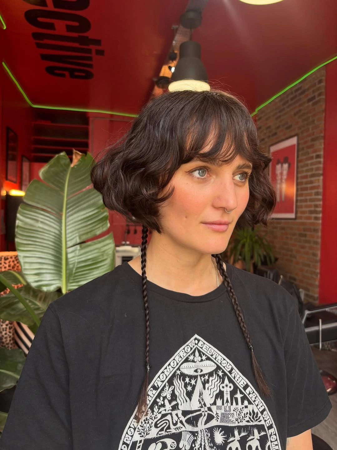 fall hairstyles for short hair 2026 Wavy Bob With Tiny Braids And Wispy Fringe