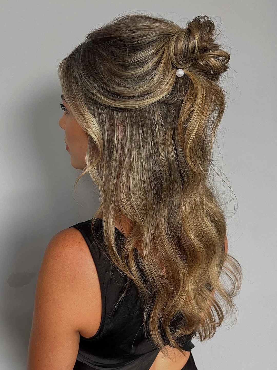 fall hairstyles for wedding guests 2026 Blonde Half-Up Waves With A Pearl Accent