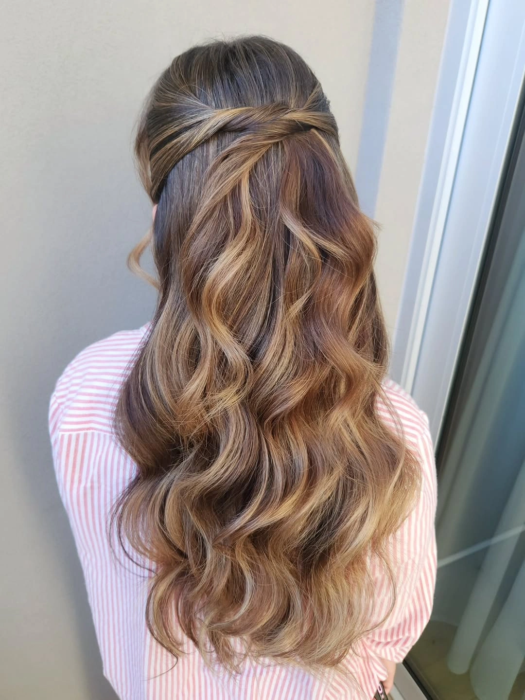 fall hairstyles for wedding guests 2026 Golden Half-Up Waves With A Twisted Crown