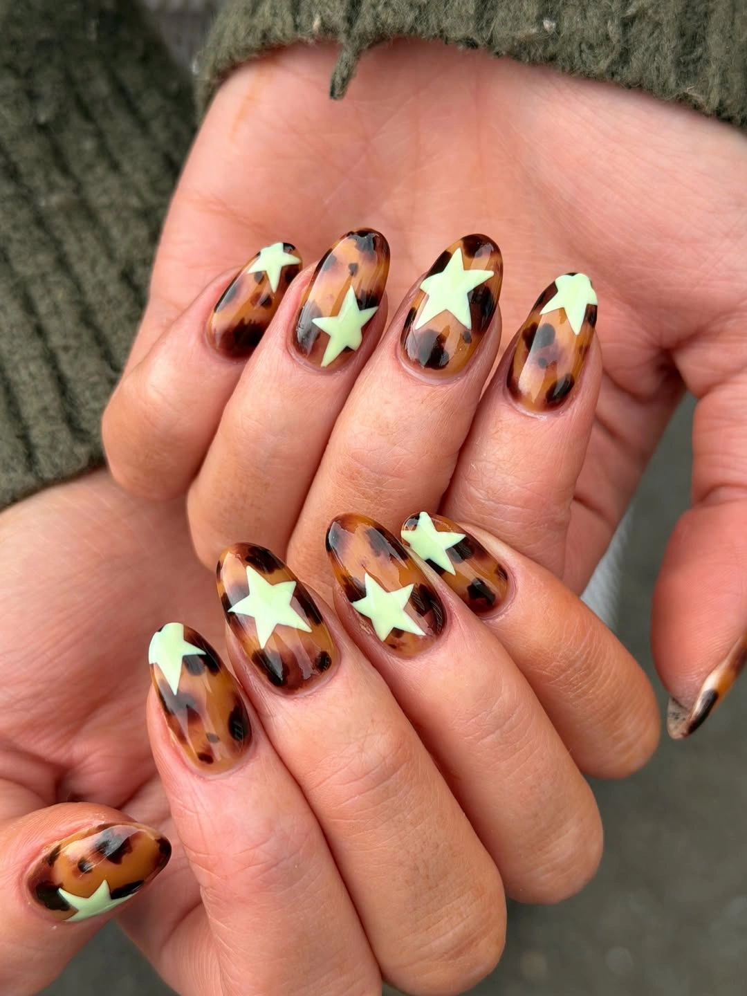 fall manicure 2026 Tortoise Star Manicure With Cream Accents