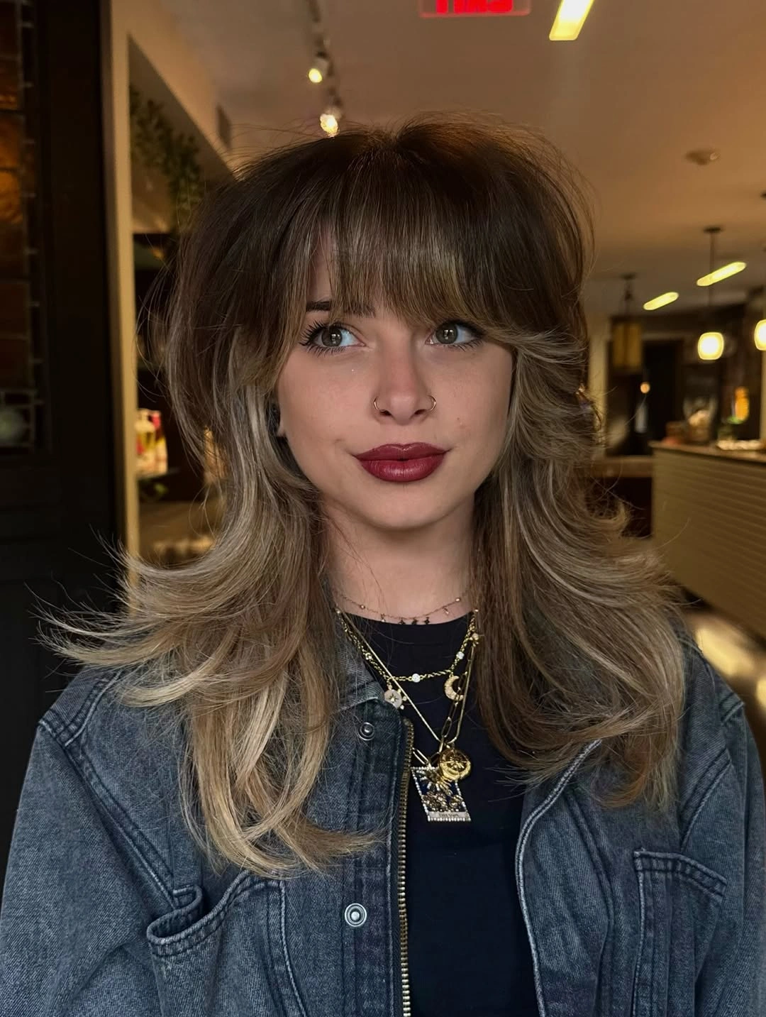 fall medium haircuts 2026 Soft Shag Layers With Airy Curtain Bangs