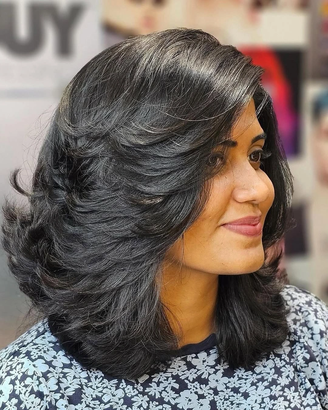 fall medium haircuts 2026 Feathered Black Layers With Full Fall Volume