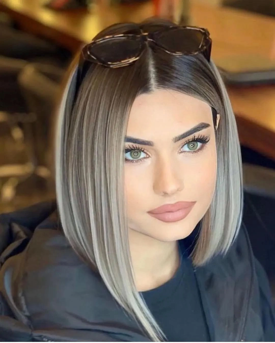 fall medium haircuts 2026 Smoky Ombre Lob With A Glassy Center Part