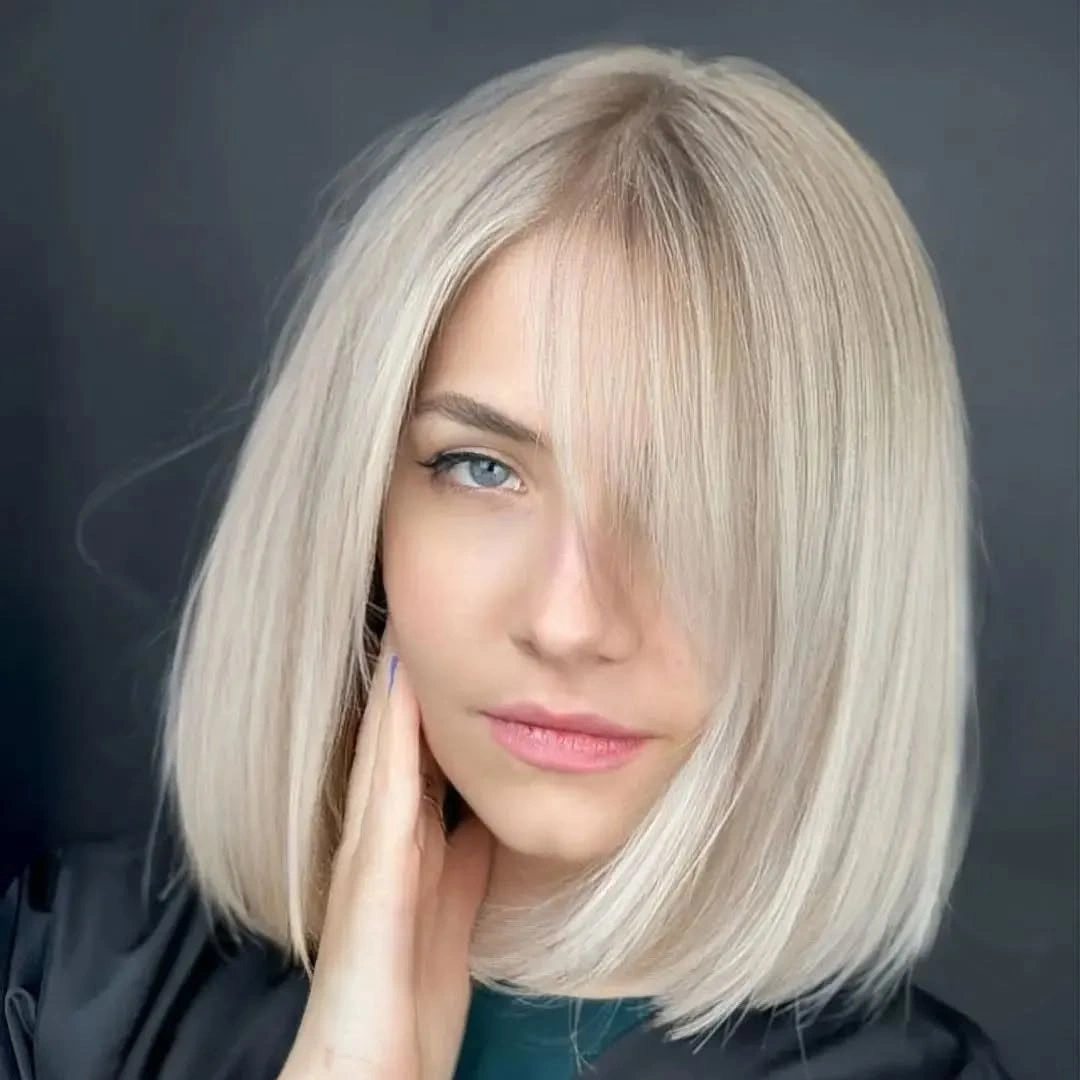 fall medium haircuts 2026 Platinum Shoulder Bob With A Soft Side Veil