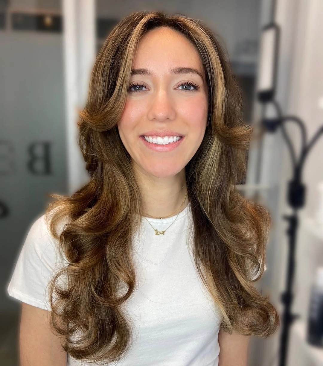 fall medium haircuts 2026 Polished Butterfly Layers With Soft Brunette Dimension
