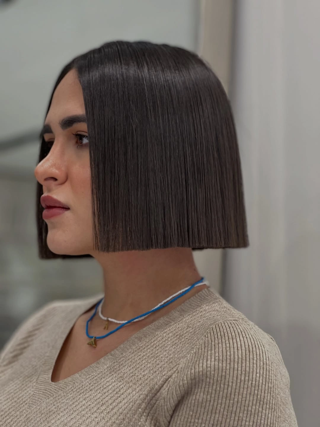 fall medium haircuts 2026 Sharp Straight Bob With A Minimal Fall Finish