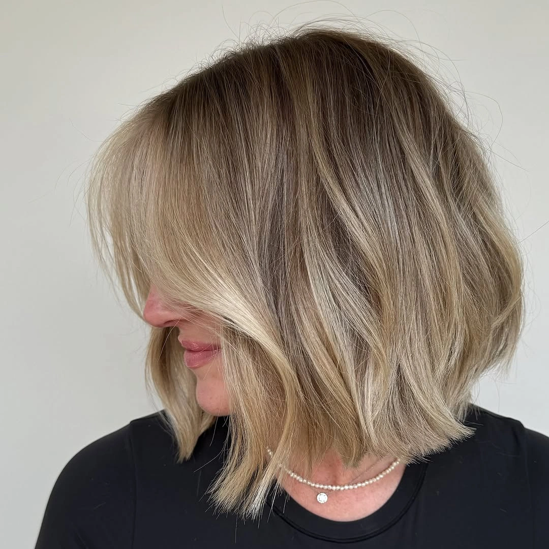 fall medium haircuts 2026 Soft Blonde Lob With Wispy Face-Framing Layers