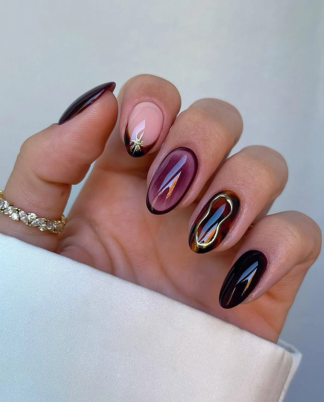 fall nail art 2026 Jewel Tone Swirls On Dark Fall Nails