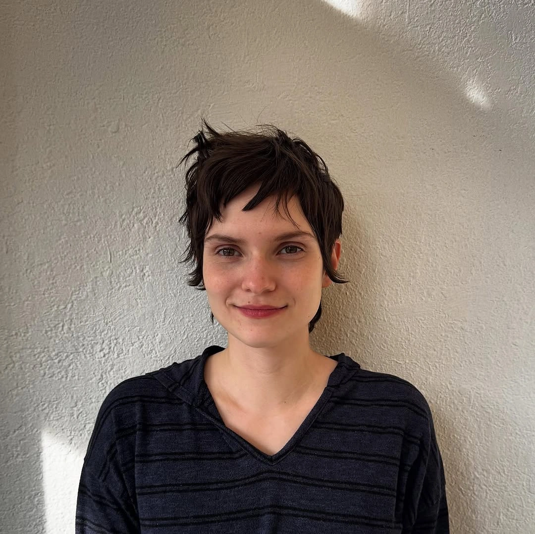 fall pixie haircut ideas 2026 Shaggy Espresso Pixie With Flipped Side Pieces