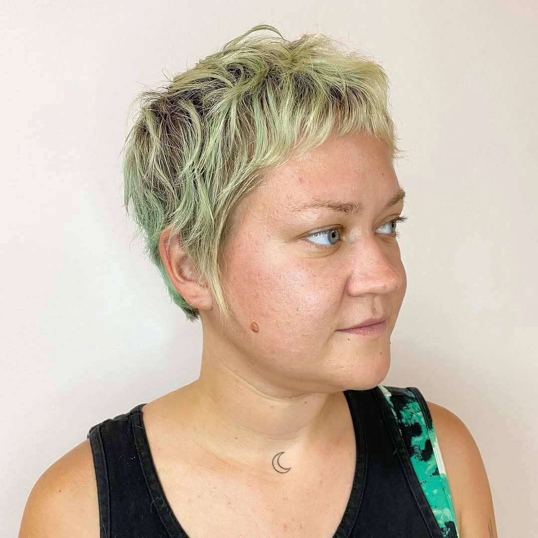 fall pixie haircut ideas 2026 Muted Mint Pixie With Tousled Micro Bangs