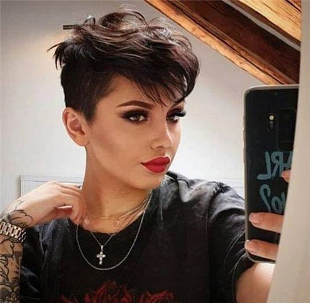 fall pixie haircut ideas 2026 Voluminous Brunette Undercut With Swept Bangs