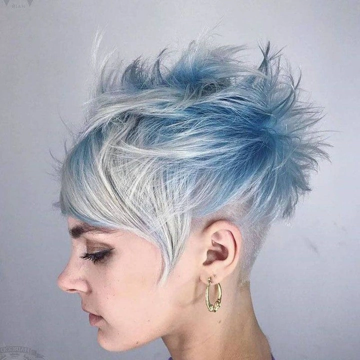 fall pixie haircut ideas 2026 Icy Blue Undercut Pixie With a Feathered Side Fringe