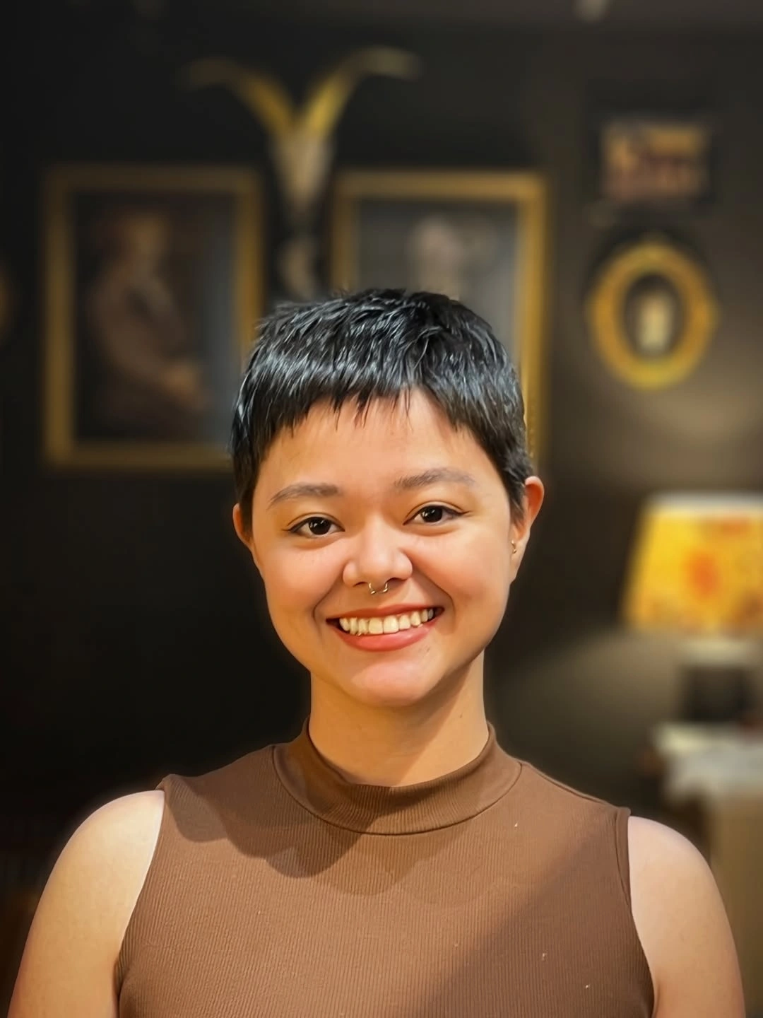 fall pixie haircut ideas 2026 Glossy Black Crop With a Neat Short Fringe