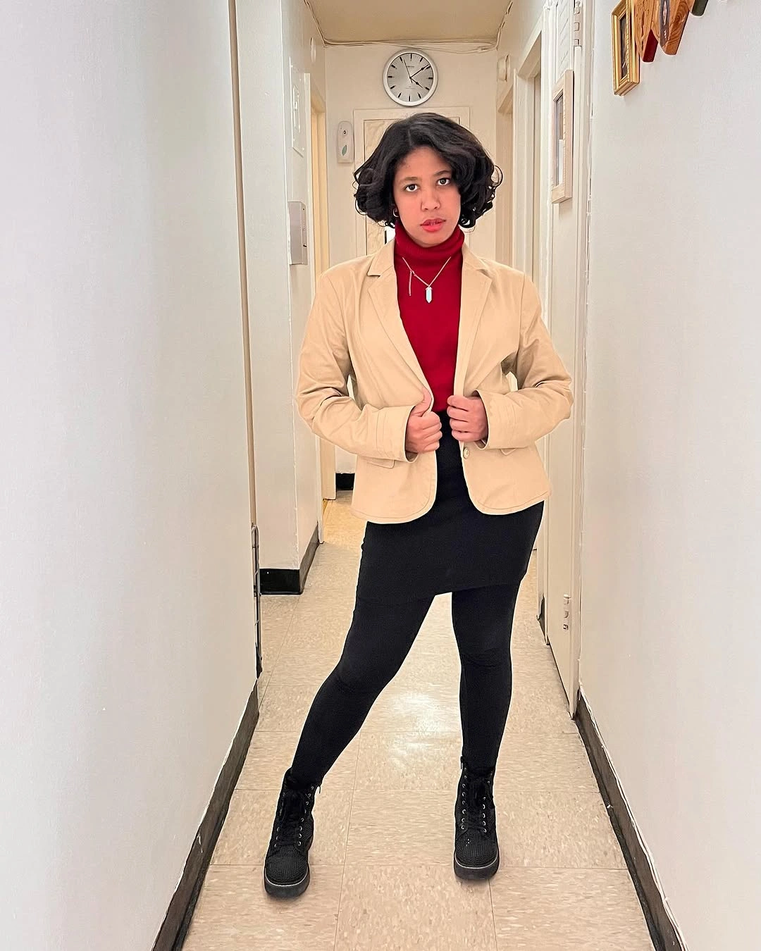 fall professional outfits women 2026 Red Turtleneck and Black Mini Skirt for a Smart Fall Layered Look