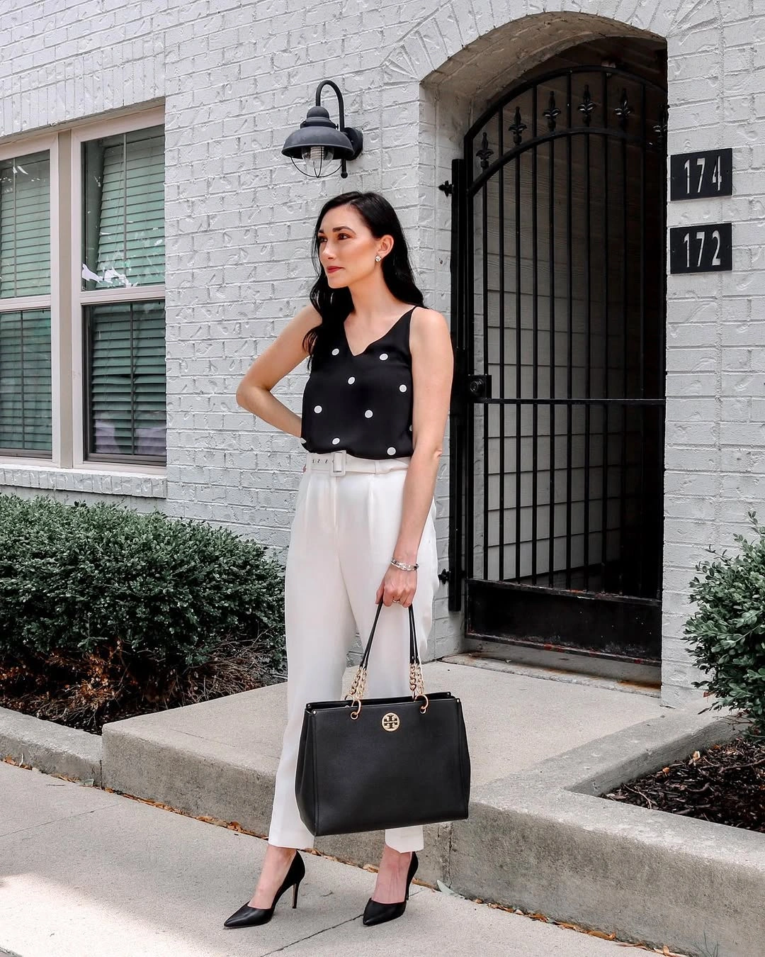 fall professional outfits women 2026 Polka Dot Blouse and Ivory Trousers for a Refined Office Look