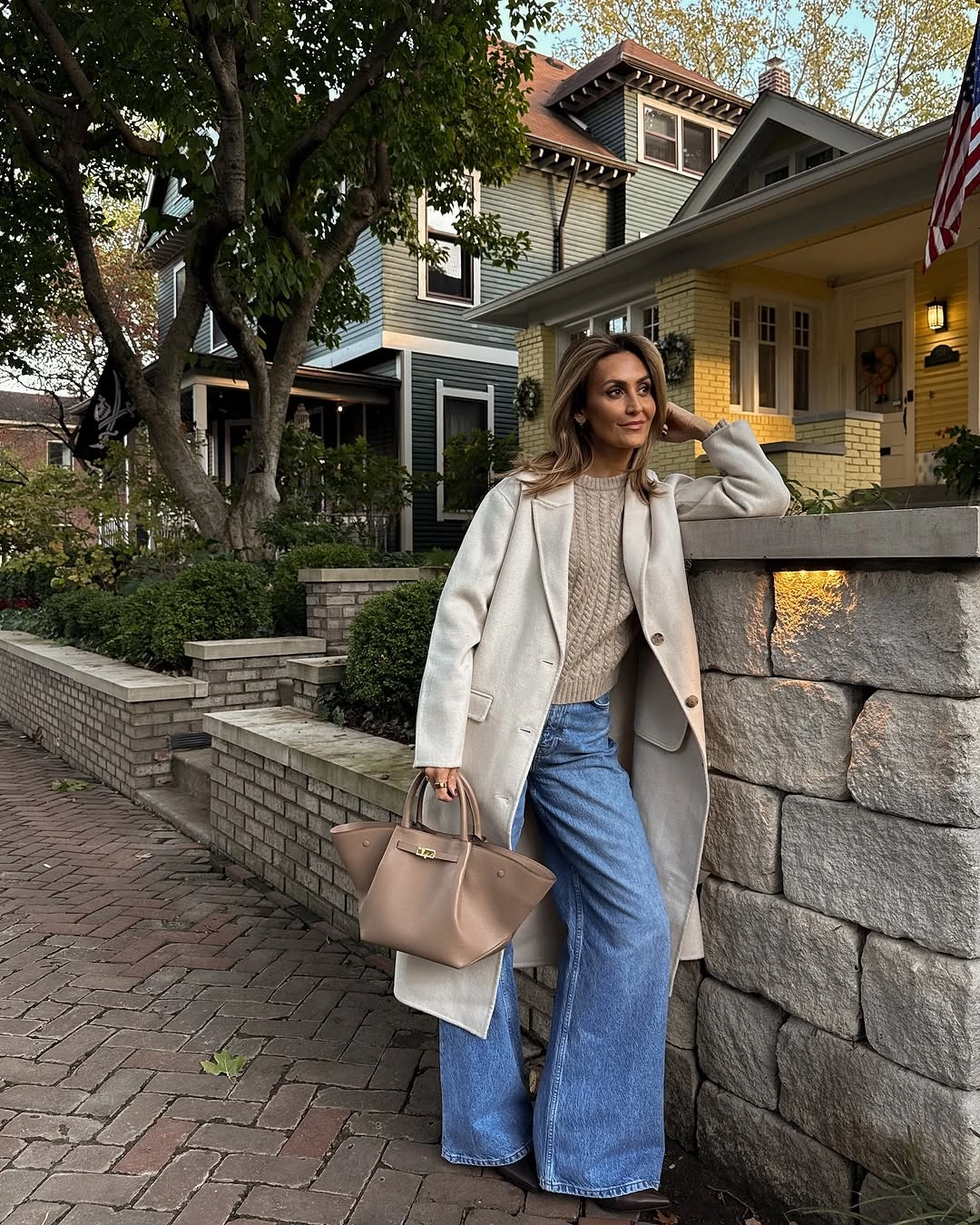 fall professional outfits women 2026 Ivory Coat, Cable Knit, and Wide-Leg Denim with Smart Boots