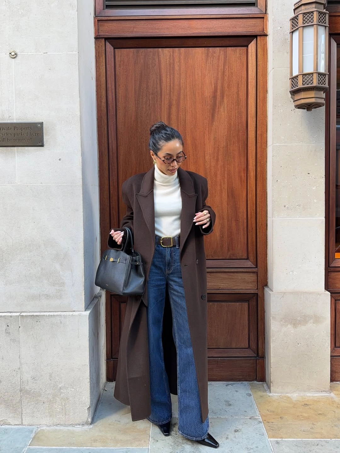 fall professional outfits women 2026 Chocolate Coat, Denim, and Pointed Boots for a Modern Office Day