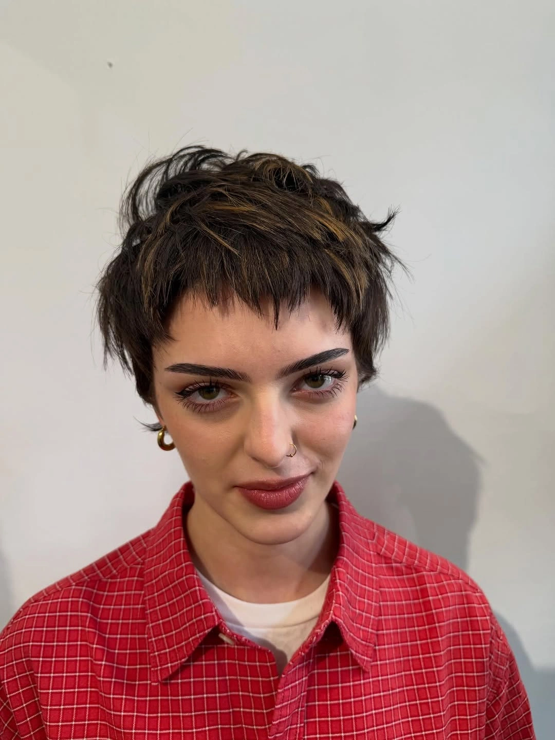 fall short haircuts 2026 + Choppy Micro-Bang Pixie With Plaid-Shirt Energy