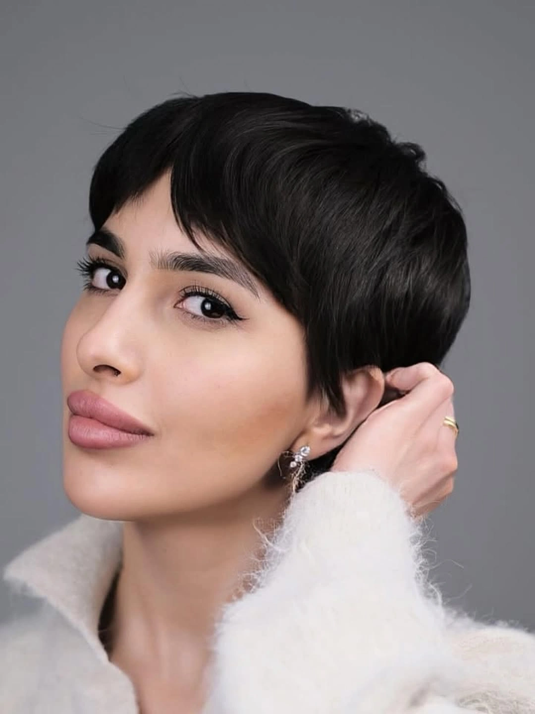 fall short haircuts 2026 + Glossy Black Pixie With Soft Side Bangs