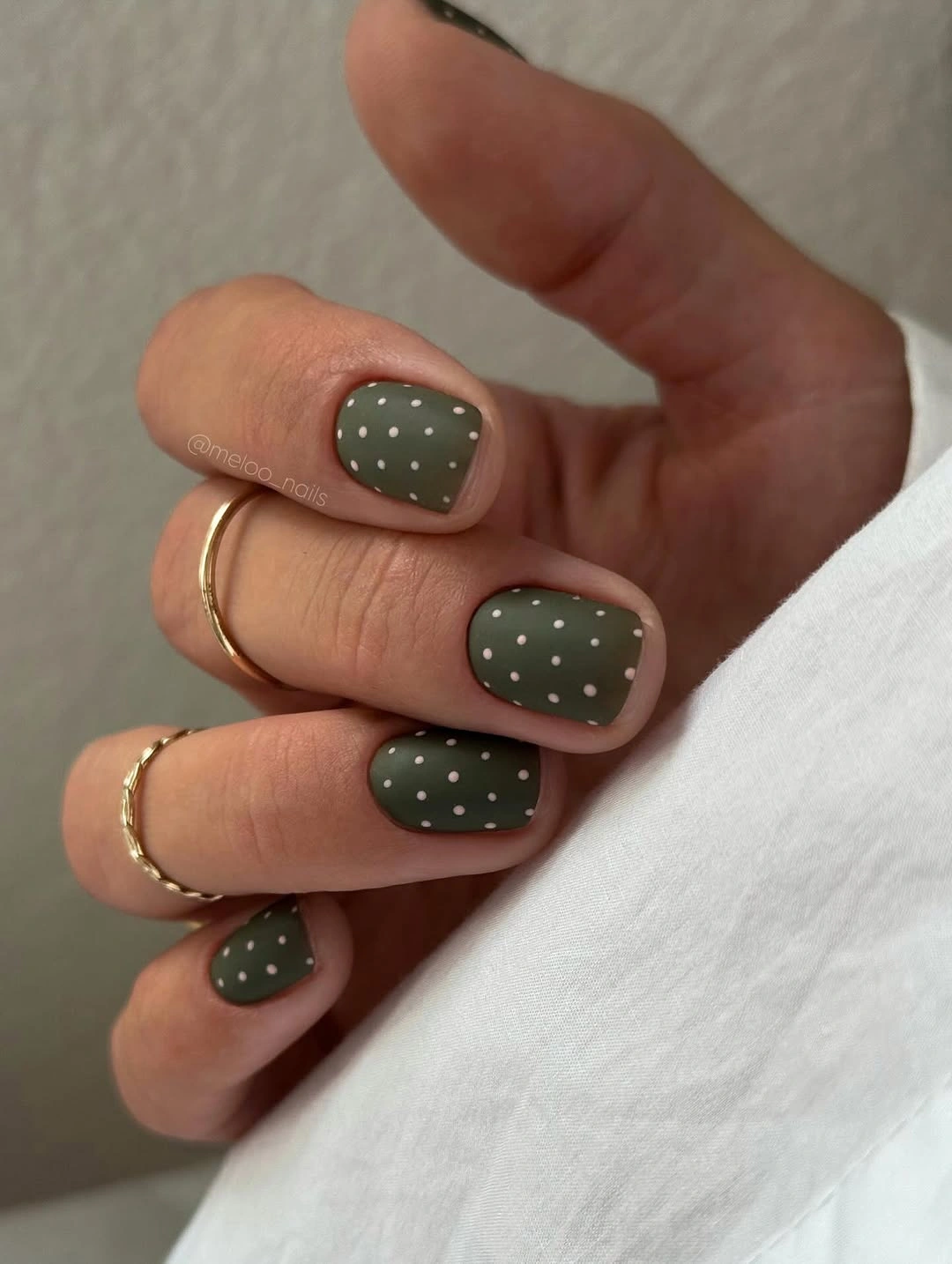 fall short nails 2026 Olive Short Nails With Tiny White Dots