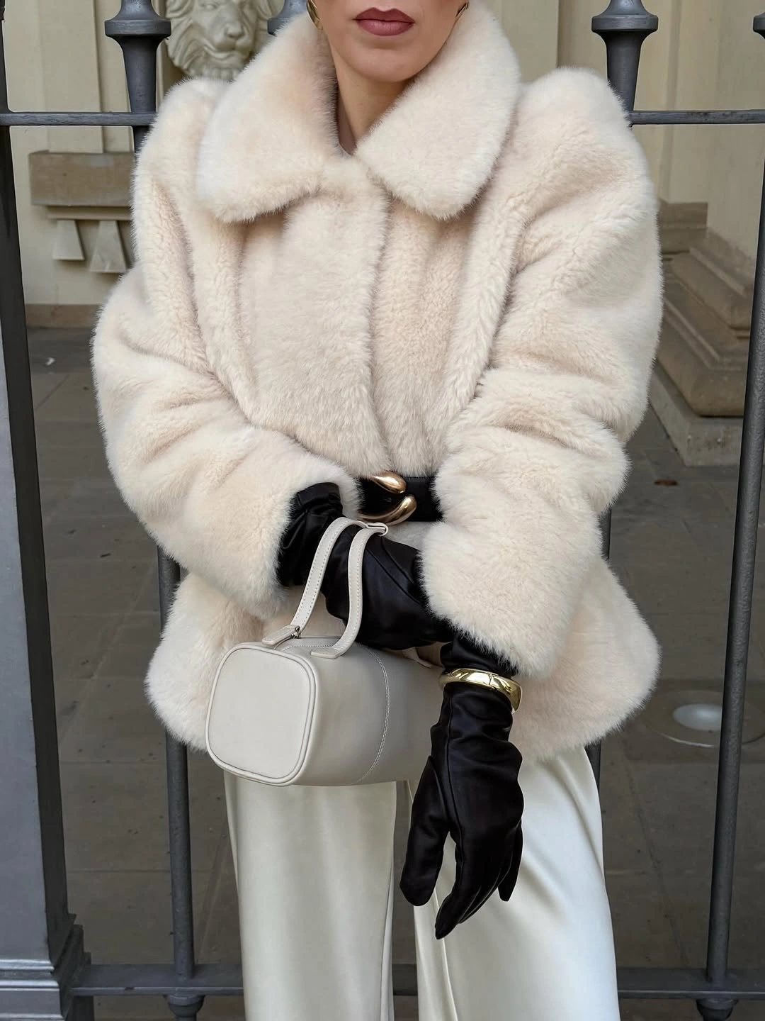 faux fur jacket Ivory Plush Jacket With Black Gloves and Gold Accents