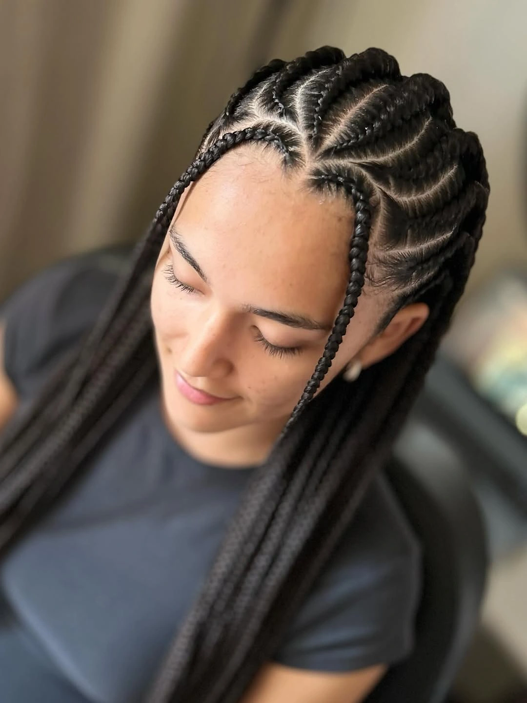 feed in braid hairstyles Star-Part Feed-In Braids With Face-Framing Pieces