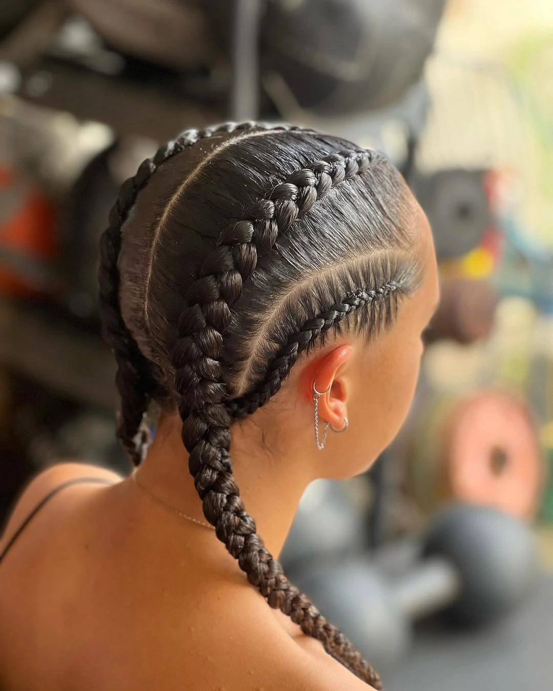 feed in braid hairstyles Glossy Wide-Part Feed-In Braids