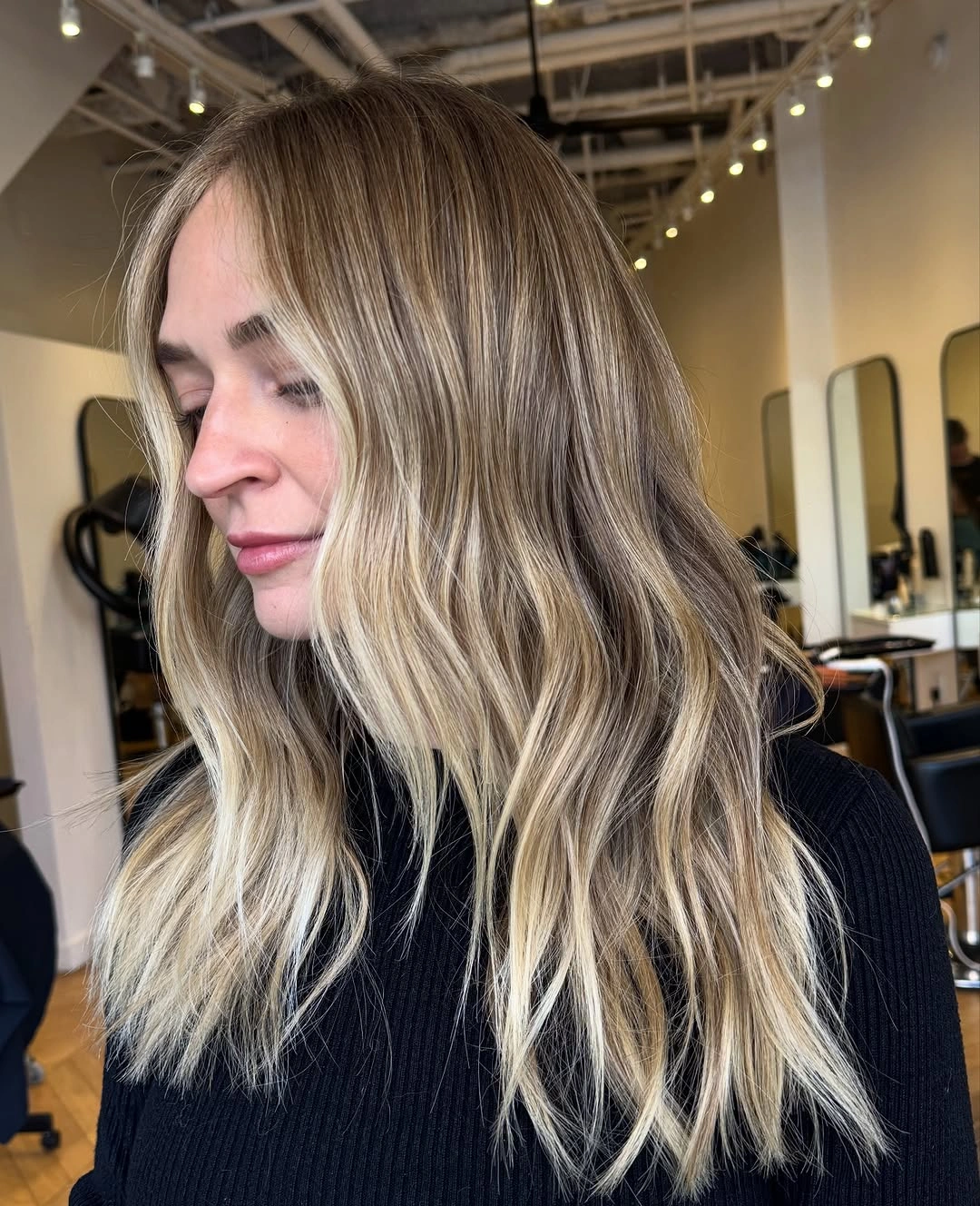 hair lowlights color ideas and inspiration Long Cool Blonde With a Soft Ash Brown Base