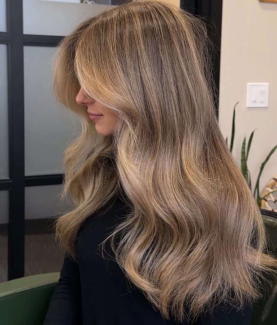 hair lowlights color ideas and inspiration Long Beige Blonde Blowout With Mushroom Depth