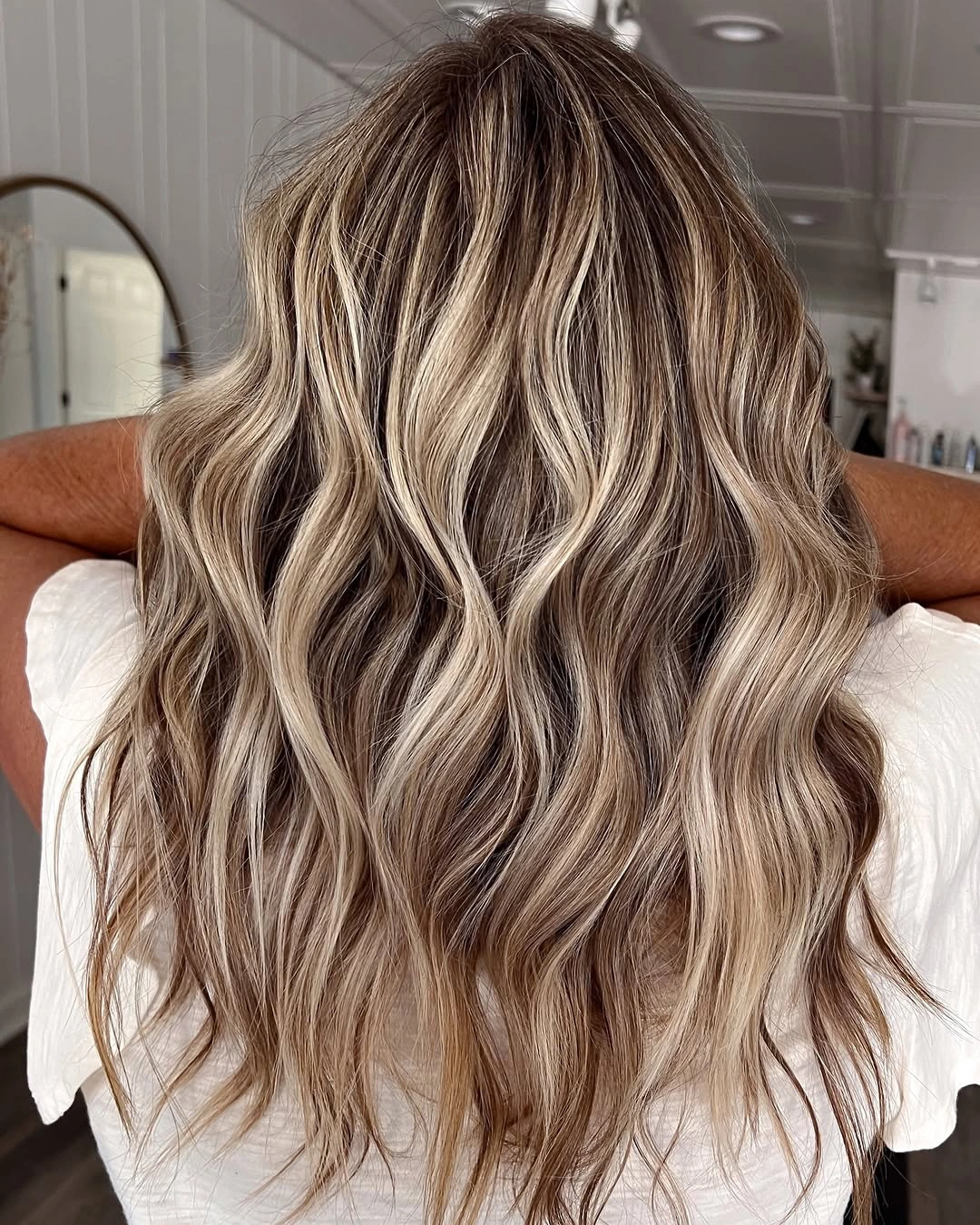 hair lowlights color ideas and inspiration High-Contrast Ash Bronde With Broad Dark Panels