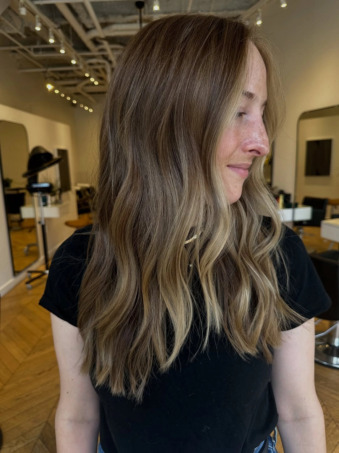 hair lowlights color ideas and inspiration Long Ash Brunette With Sparse Beige Ribbons
