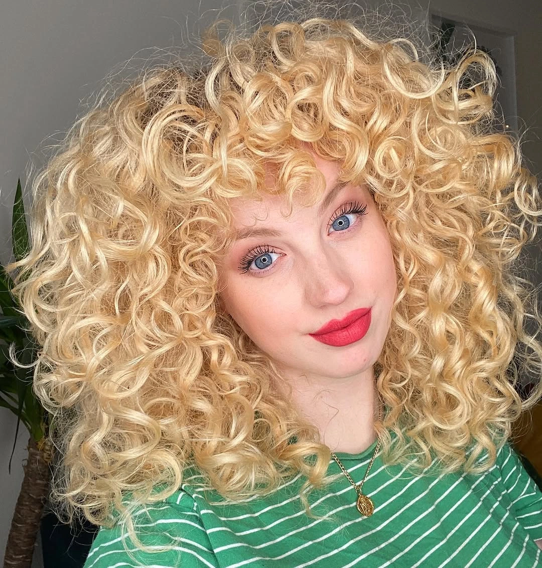 heatless curls hairstyle Blonde Cloud Curls With Retro Bangs