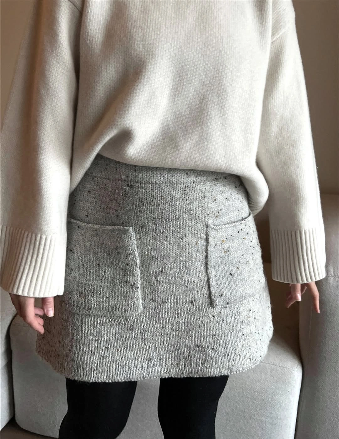 knit skirt outfits fall 2026 + Cream Sweater With A Grey Pocket Mini