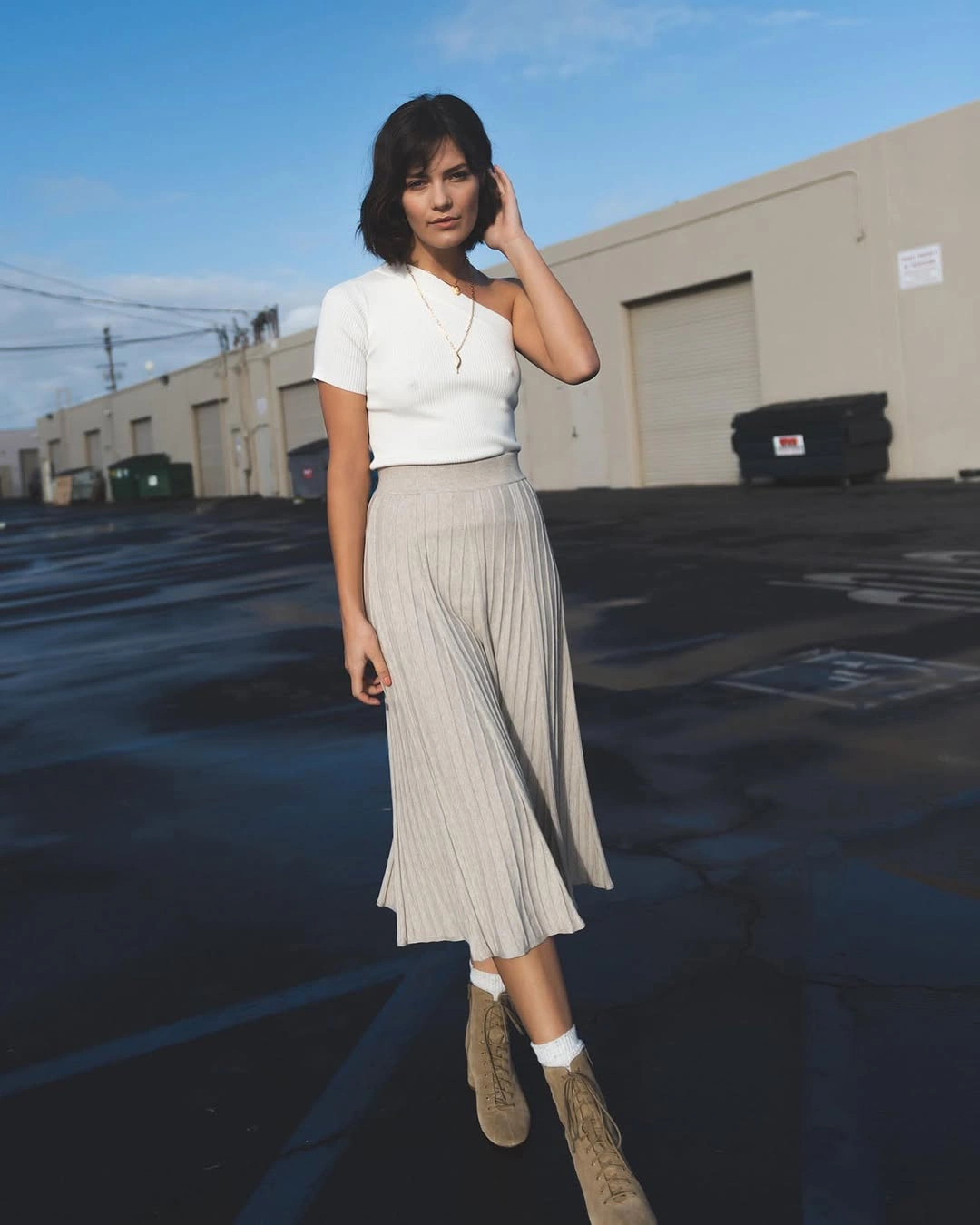 knit skirt outfits fall 2026 + White One-Shoulder Knit With A Grey Pleated Skirt