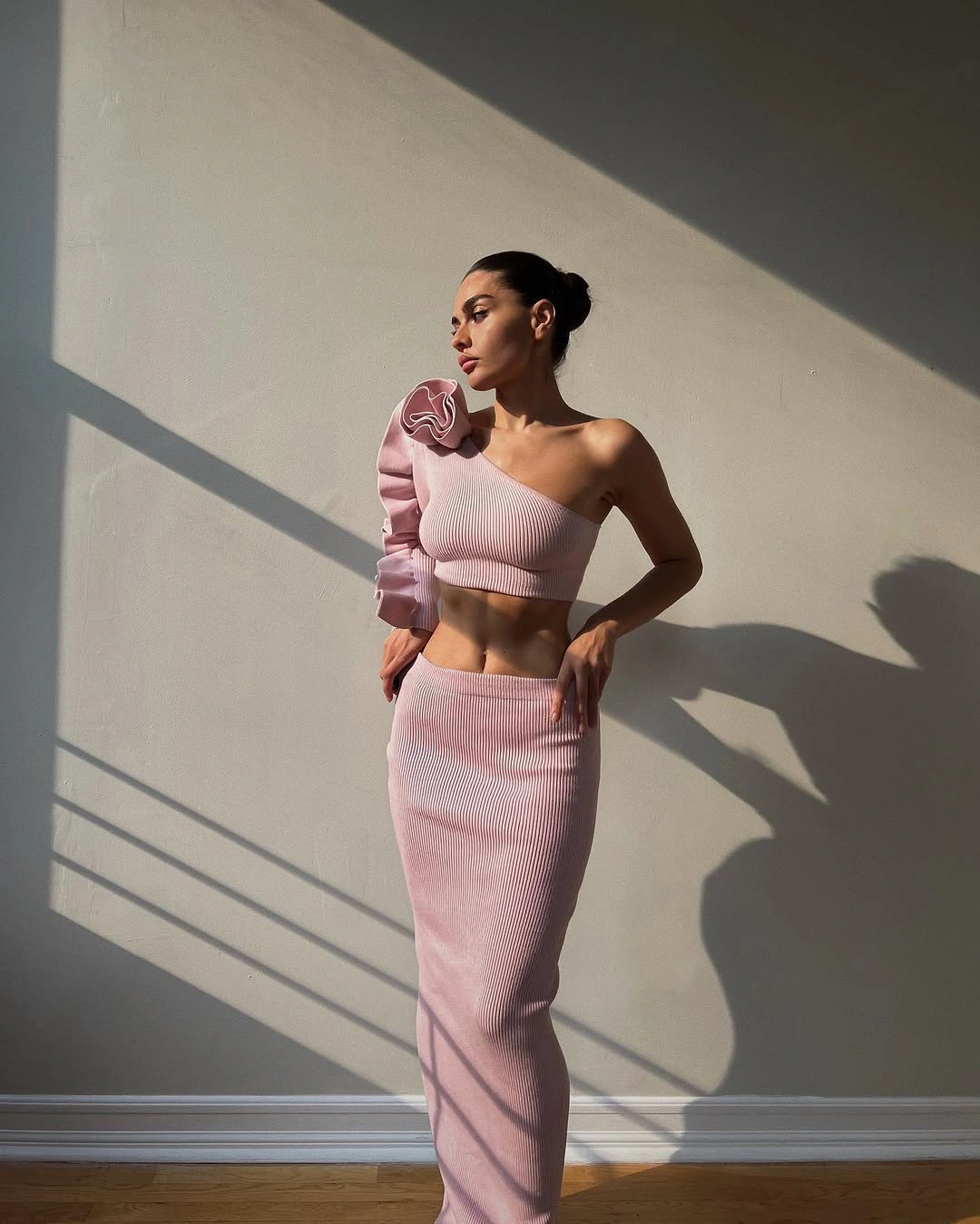 knit skirt outfits fall 2026 + Pink Ribbed Knit Set With Sculptural Detail